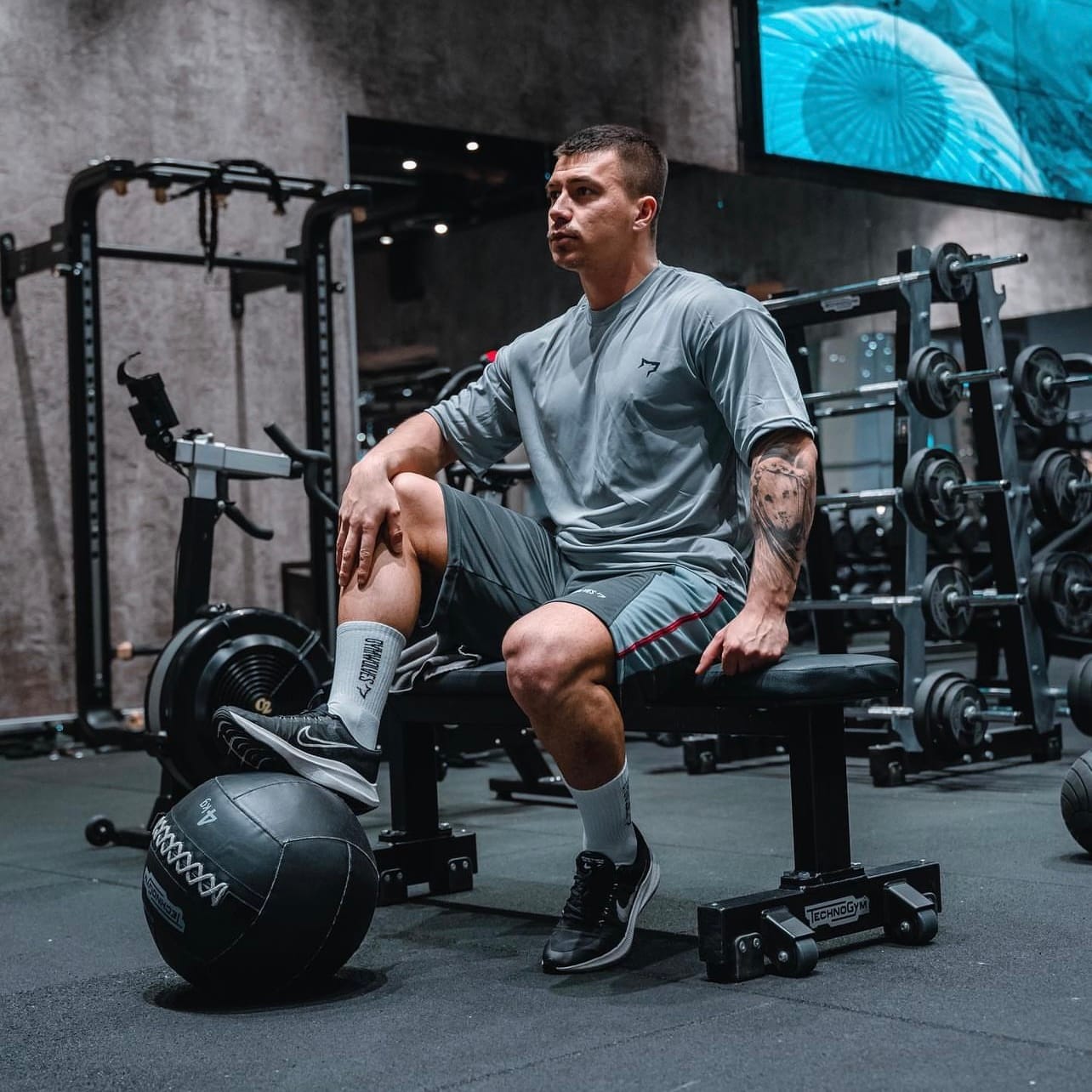 GYMWOLVES campaign shoot — athlete between sets in the gym