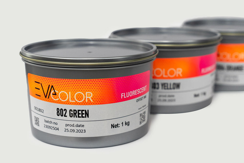 EVCOLOR fluorescent offset ink tins — color codes and batch numbers on the labels